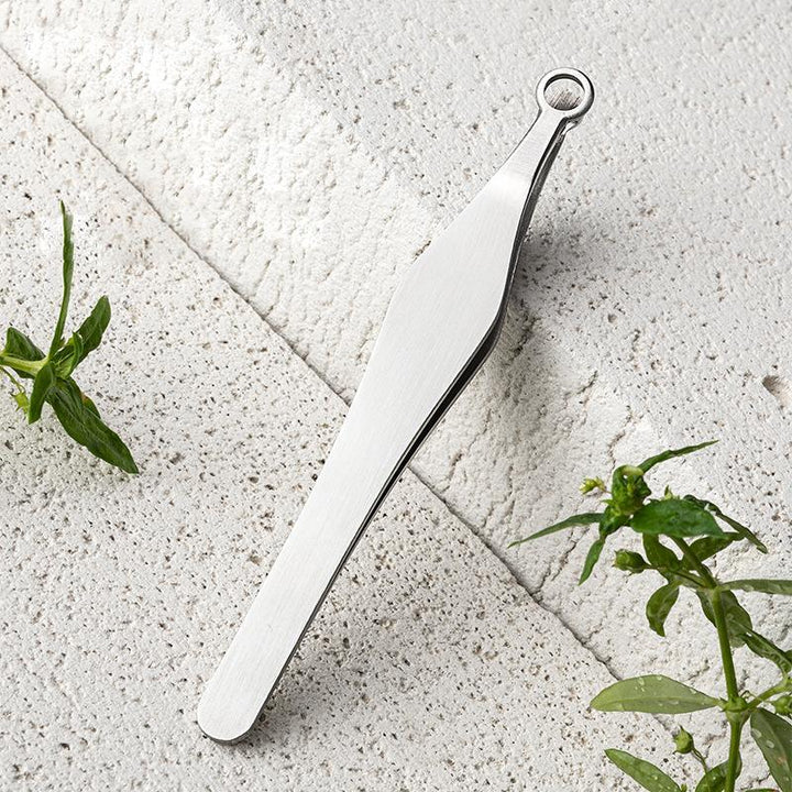 Durable stainless steel manual trimmer for nose, ear, and eyebrow hair removal, unisex design