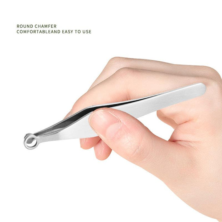 Close-up of a sleek stainless steel nose & ear hair remover, essential for personal care