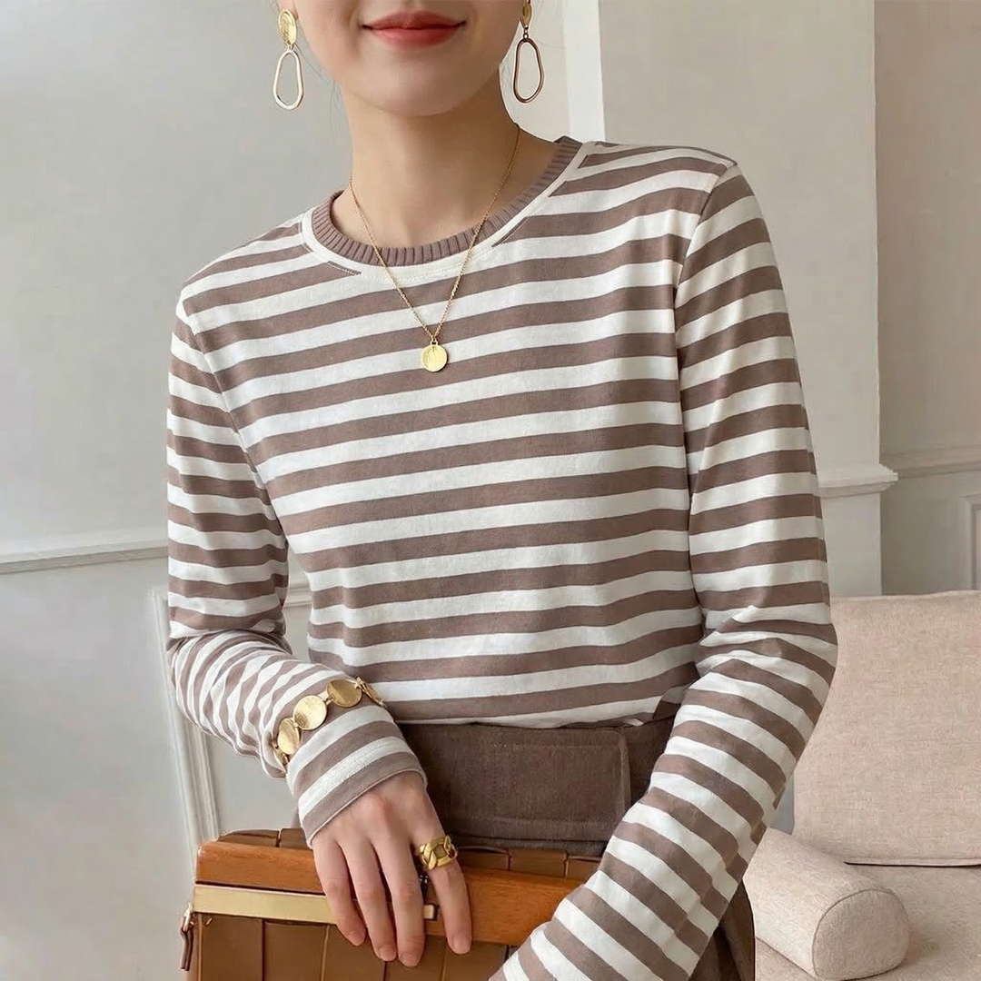 Stylish unisex long sleeve tee in soft striped cotton, perfect for a relaxed casual look.