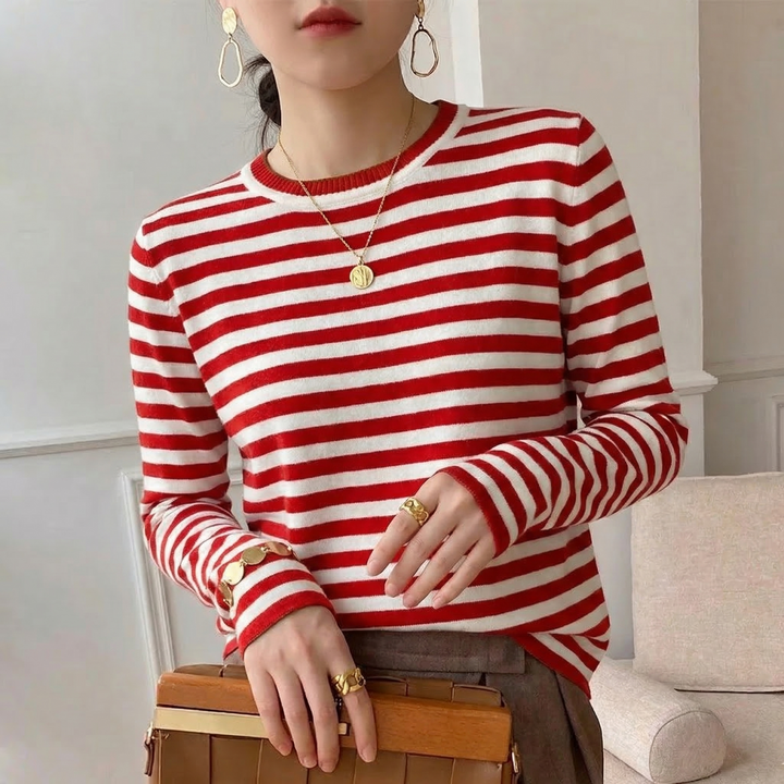 Fashionable unisex striped cotton long sleeve top, offering comfort and a casual aesthetic.