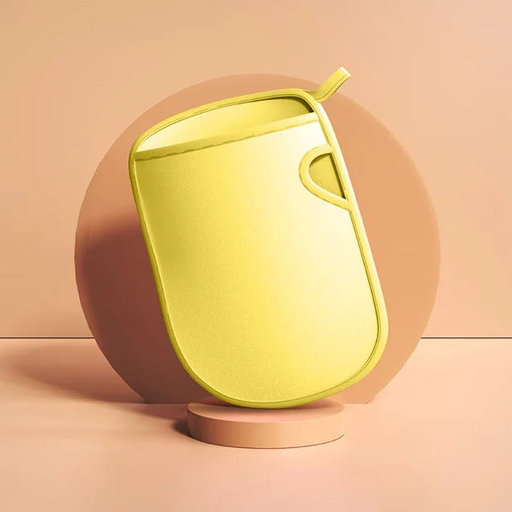 Skin care accessory: PVA exfoliating bath mitt, shown with a minimalist background