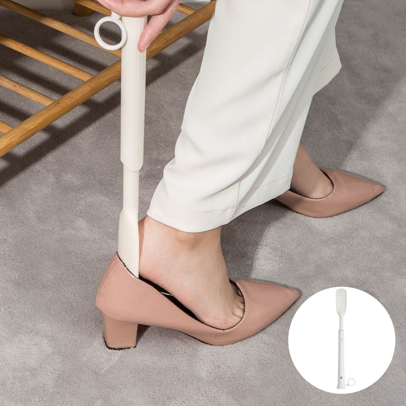 Unisex telescopic long-handled shoe horn extended, simplifying footwear application for all