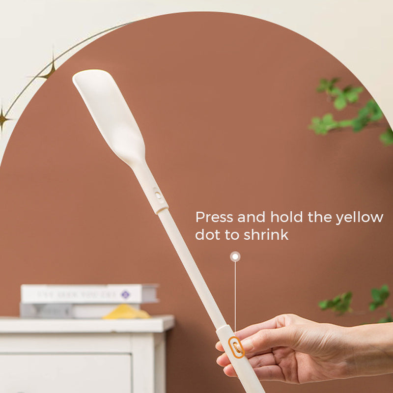 Shoe horn with a hook for hanging, emphasizing home organization & accessibility as a mobility aid