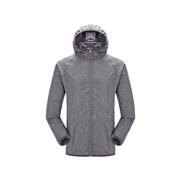 Outdoor shot of the ultra-lightweight windbreaker, reflecting its use as essential weather protection.