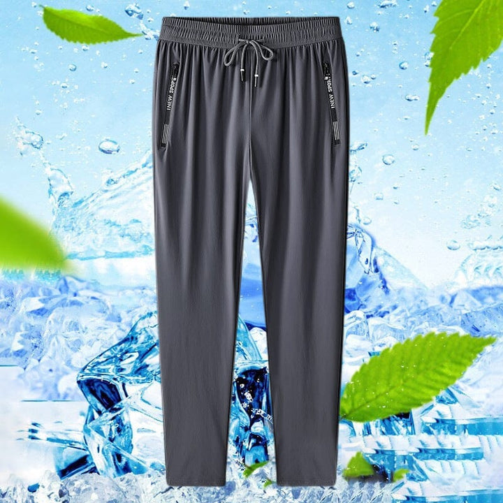 Unisex quick dry pants folded neatly, showcasing their compact and travel-friendly design