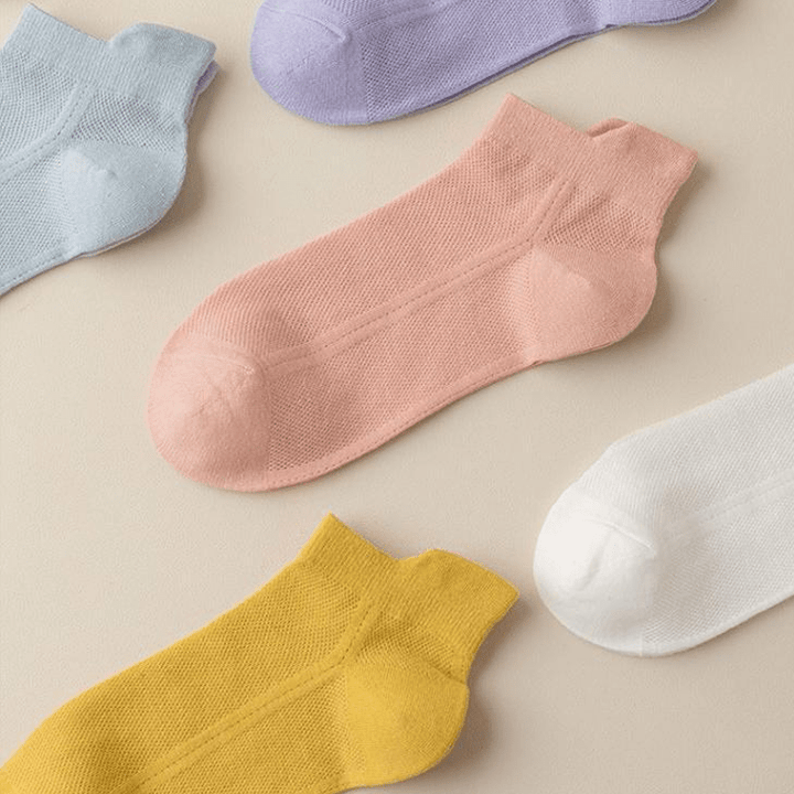 Multiple pairs of Ultra-Thin Liner No-Show Socks, showcasing their invisible design and comfort.