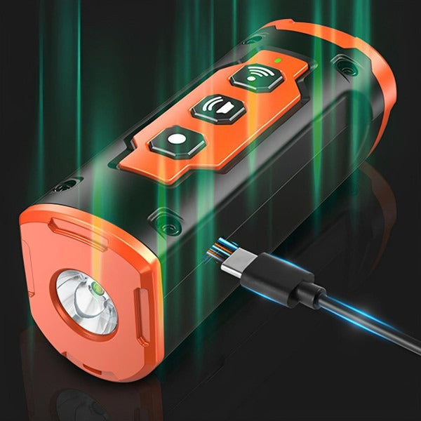 Portable orange & black ultrasonic device for dog training & obedience.