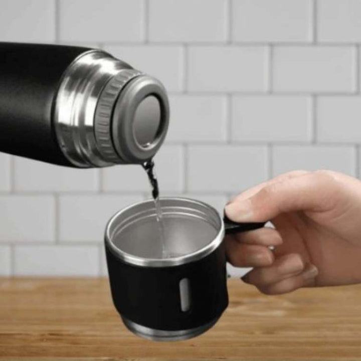 Hot/cold vacuum insulated stainless steel water bottle. Leak-proof design, perfect for outdoor & travel.