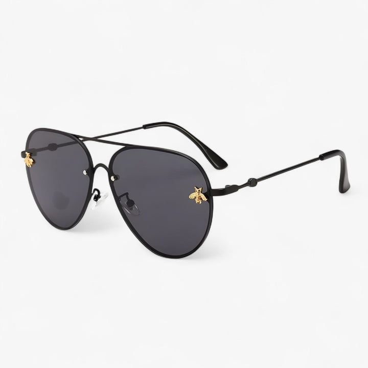 Unisex vintage aviator sunglasses with unique gold bee detail on metal frame. Stylish retro pilot eyewear.