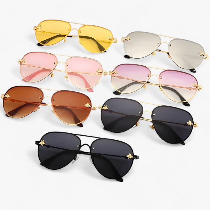 Elegant vintage aviator sunglasses with a unique bee design, ideal for stylish summer outfits.