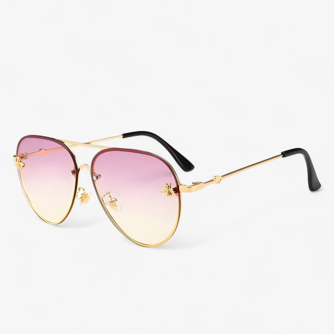 Classic vintage pilot sunglasses featuring an elegant bee detail, UV400 protection, and sturdy metal frame.