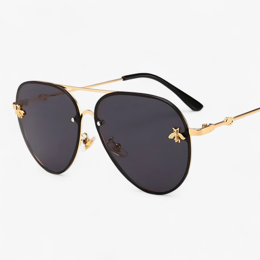 Stylish unisex aviator sunglasses with intricate bee accent. Perfect retro eyewear for summer & travel.