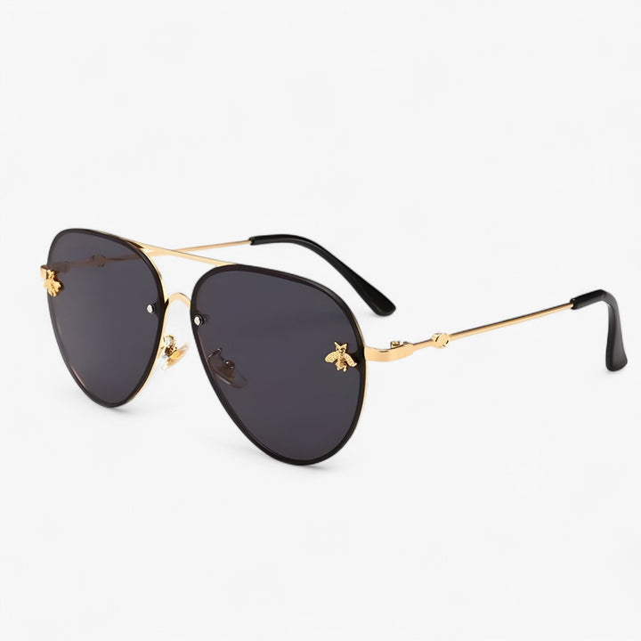 Retro pilot sunglasses, unisex design, showcasing a distinctive bee detail. Fashionable metal frame.