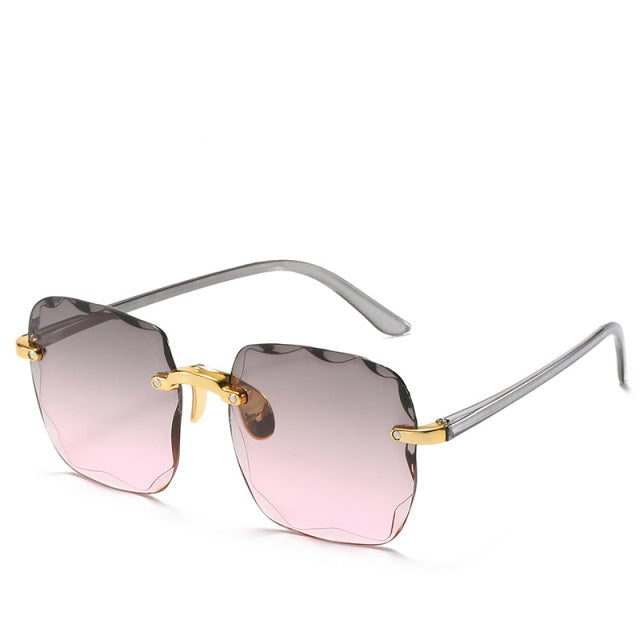 Fashionable unisex sunglasses, vintage rimless with UV400 eye protection for summer style.