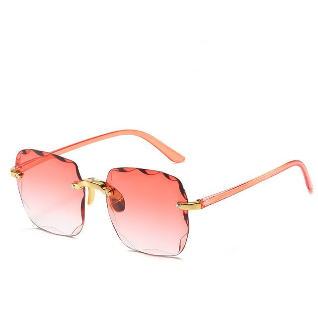 Unisex vintage sunglasses, rimless design, UV400 protected lenses, perfect summer accessory.