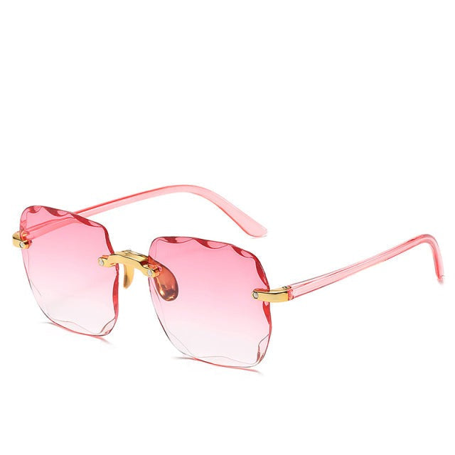 Trendy rimless vintage sunglasses with UV400 protection, essential unisex fashion eyewear.