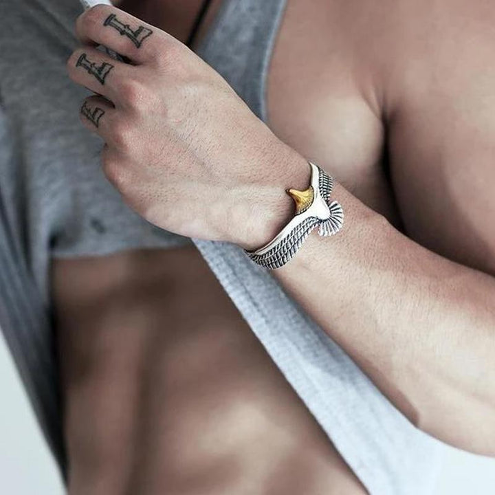 Close-up of a rustic copper eagle bracelet, unisex adjustable jewelry perfect as a fashion accessory.