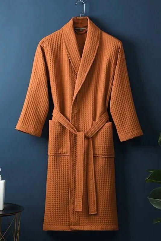 Relaxing unisex waffle robe, soft and breathable for everyday home comfort or luxury spa experiences.