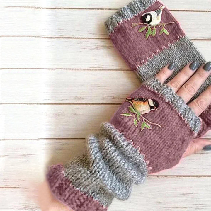 Lifestyle shot of unisex warm patchwork embroidered gloves on a frosty day, winter ready