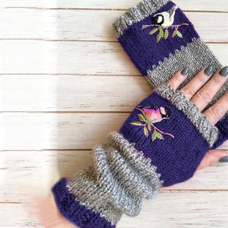 Detailed shot of the soft cotton blend fabric and embroidery on unisex warm winter gloves