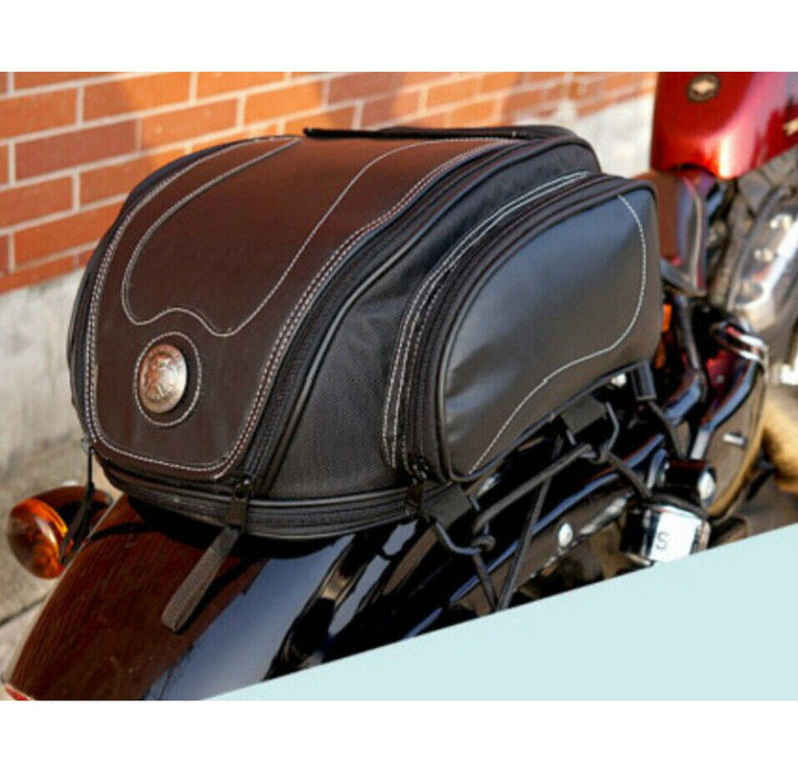Waterproof motorcycle tail bag, convertible design for versatile bike storage & riding accessories.