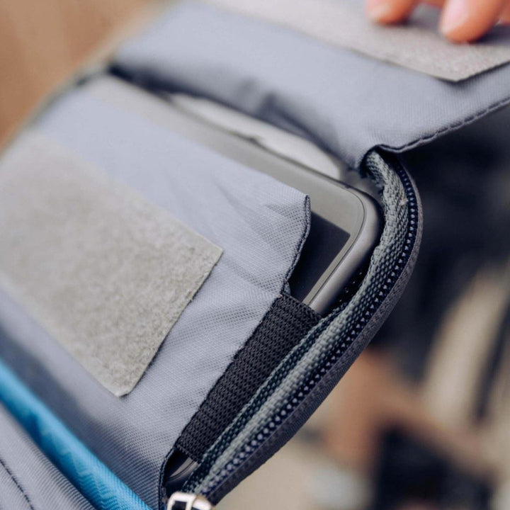 Durable cycling gear: waterproof handlebar bag & phone holder for safe bike storage during rides.