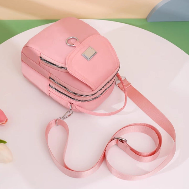 Stylish waterproof messenger bag for travel, made from robust nylon material