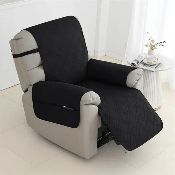 Easy-care quilted waterproof recliner slipcover, with elastic straps for a secure fit; ideal furniture protector.