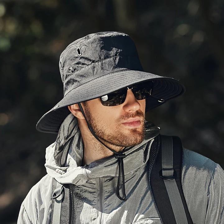 Unisex wide brim sun hat for UV protection, ideal for hiking, beach, and outdoor travel.