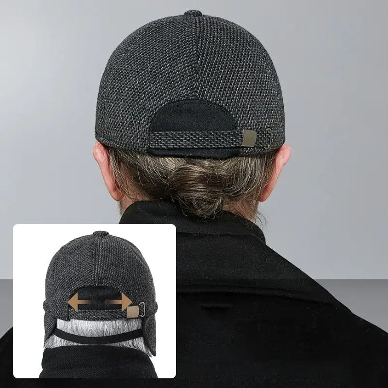 Female wearing a black unisex winter baseball cap, ear flaps up, fashionable and practical sports cap