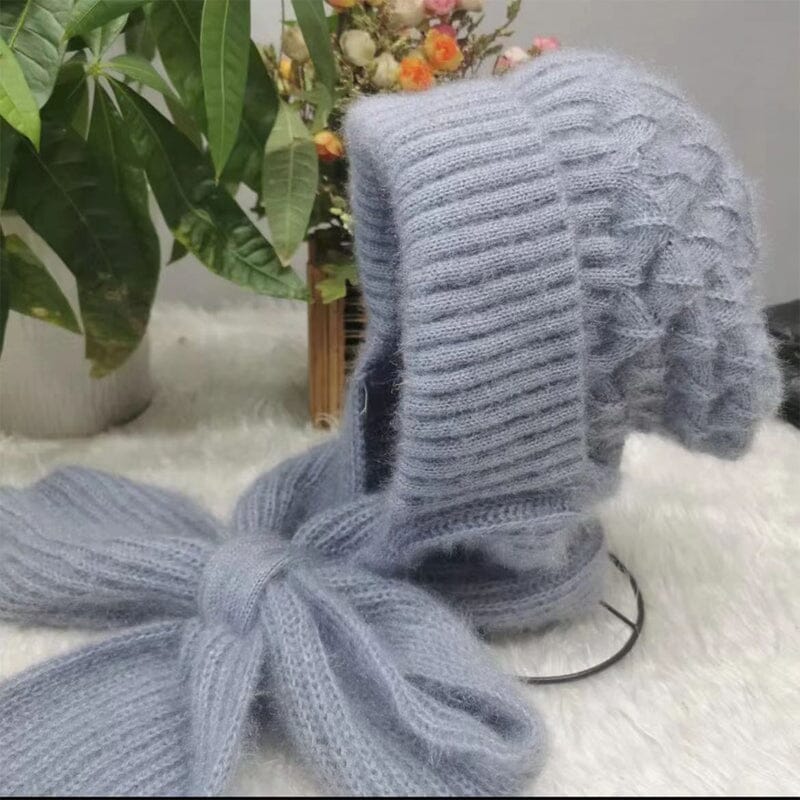 Close-up of the ear protection feature on a unisex winter knit hooded scarf, demonstrating its warmth and coverage.