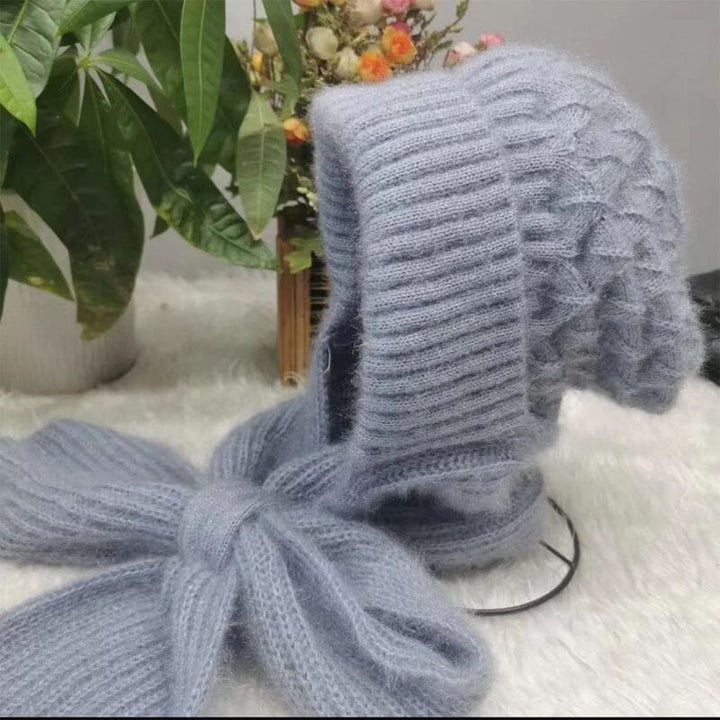 Close-up of the ear protection feature on a unisex winter knit hooded scarf, demonstrating its warmth and coverage.