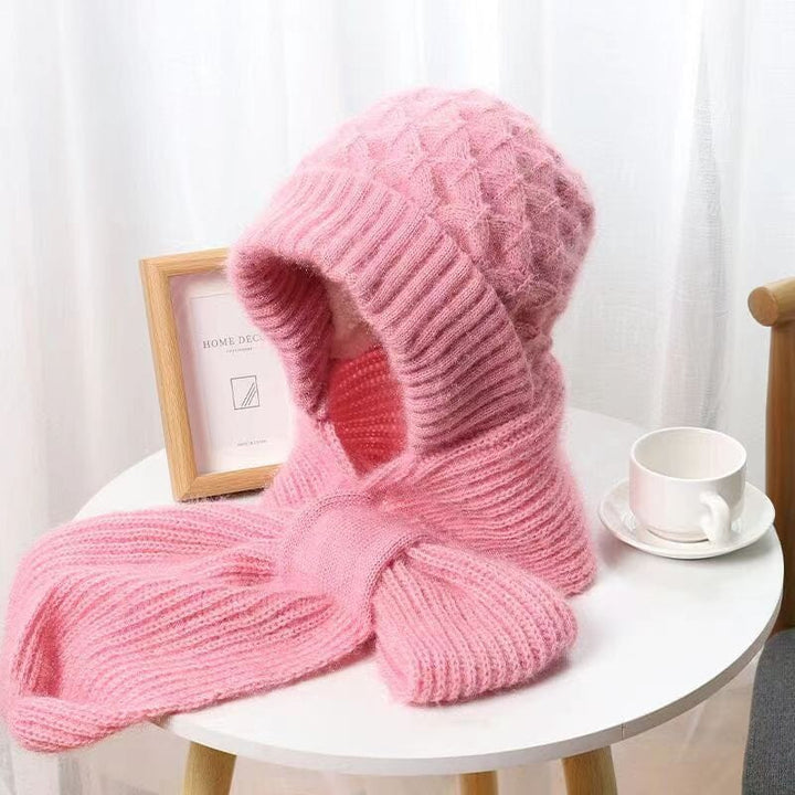 Back view of a person wearing a spacious unisex knit hooded scarf with effective ear protection for winter.