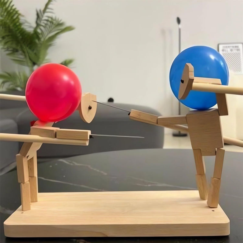 Close up of wooden battle bots with balloons, ready for a two-player balloon fight game