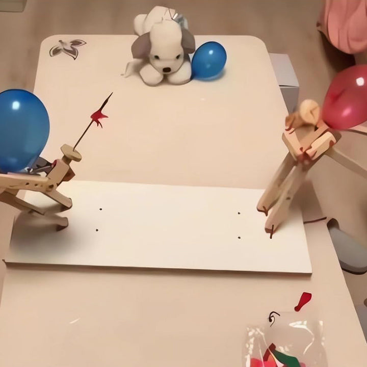 Components of Wooden Balloon Battle Bots Game: two bots, balloons, and wooden arena setup
