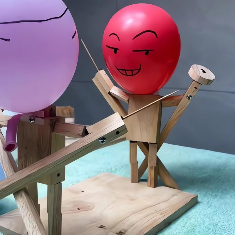 Overhead view of two wooden battle bots squaring off in a balloon fight game arena