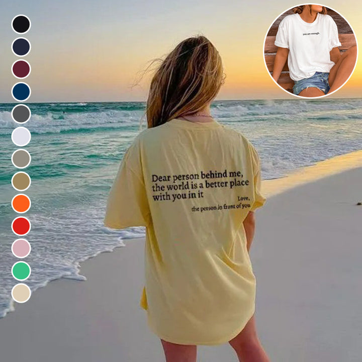 Model wearing Unisex 'You Are Enough' cotton tee, promoting mental health & positive message.