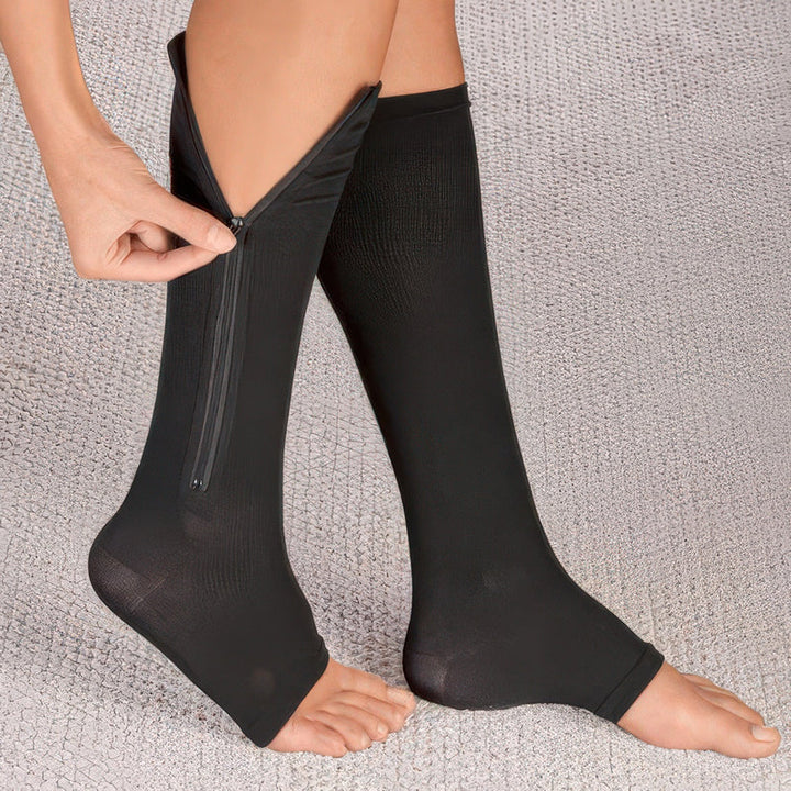 Zipper compression socks for swelling reduction & fatigue relief; ideal for nurses, travel, maternity, and daily leg support.