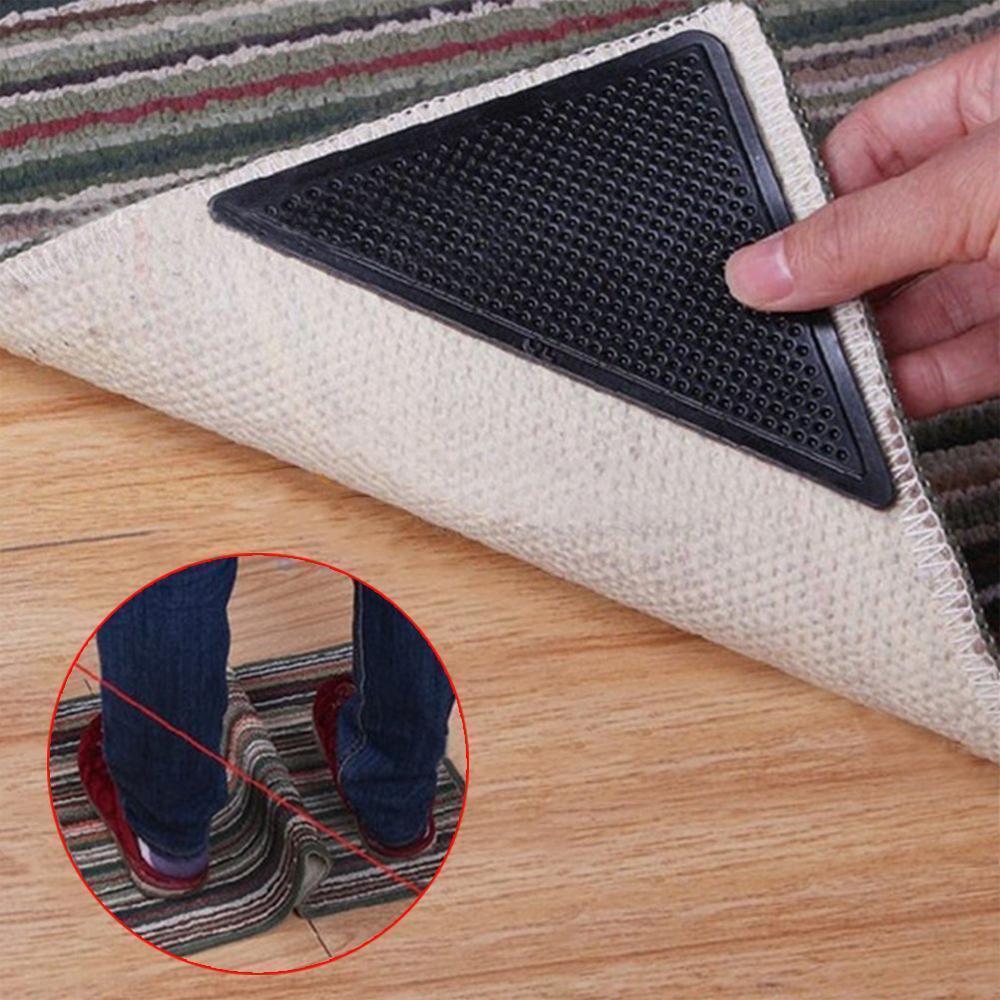 Universal anti-slip carpet corner grippers, reusable, preventing rug movement on hard floors, home safety
