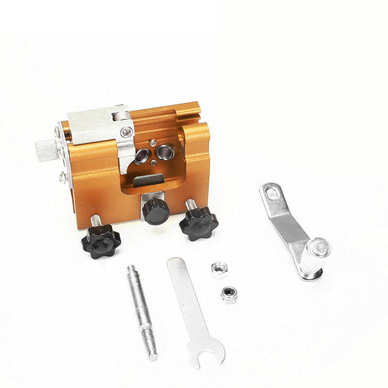 Top-down view of the chainsaw chain sharpening jig, highlighting its robust construction.