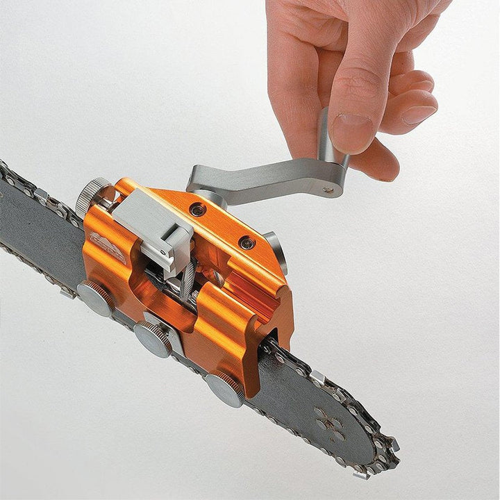Portable chainsaw chain sharpener jig shown with various saw chain types for versatility.