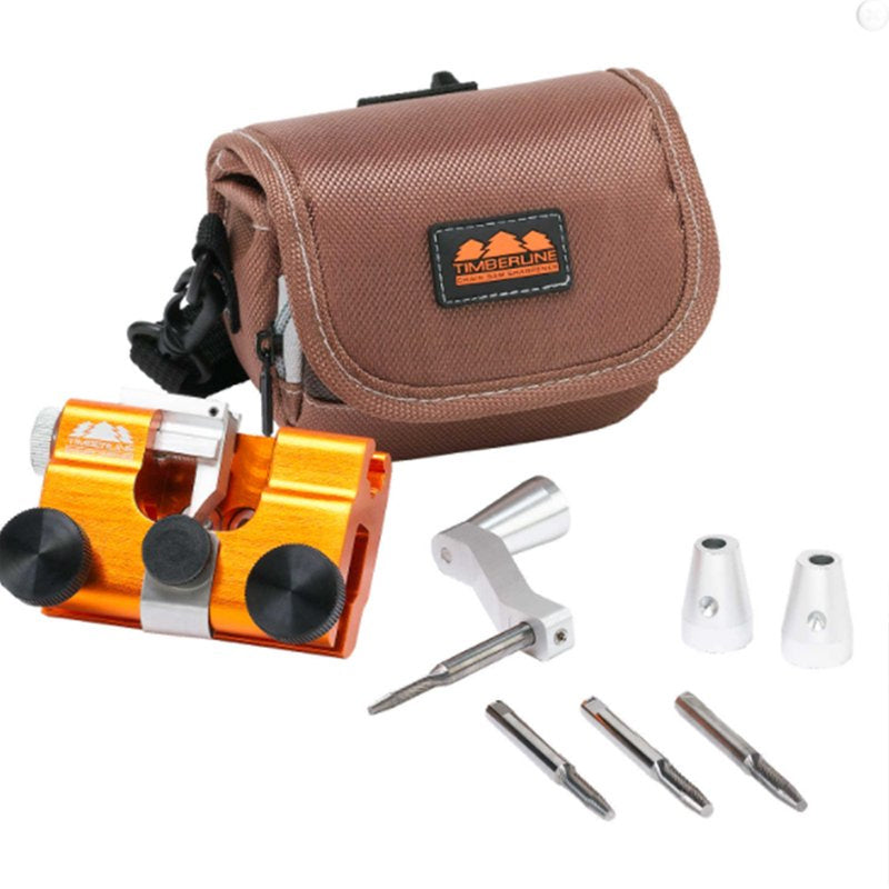 Chainsaw sharpening jig kit, including guide plates and sharpening stone, ready for use.