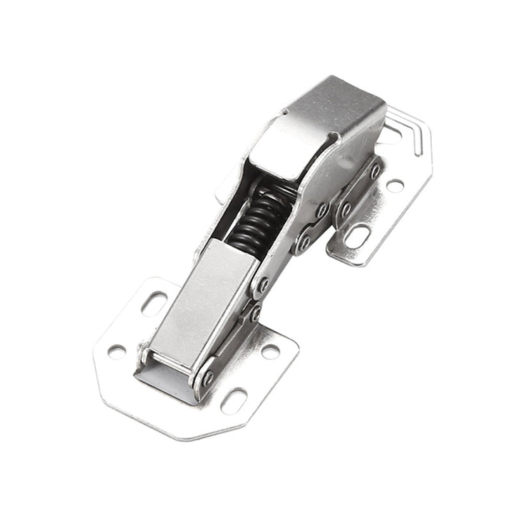 Universal drill-free cabinet hinges in a kitchen setting, smoothly closing a cabinet door