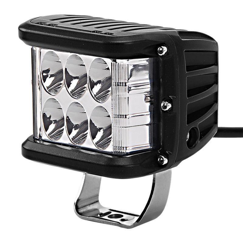 Close-up of a universal dual color LED pod light, showcasing durable housing and bright LEDs