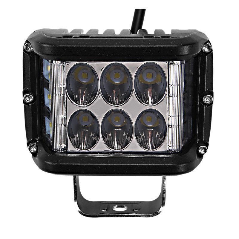 Vehicle-mounted dual color LED pod light in action, emitting a bright amber strobe for caution