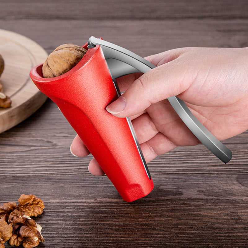 Ergonomic nut cracker for effortless opening of various nuts, a versatile kitchen tool and household gadget.