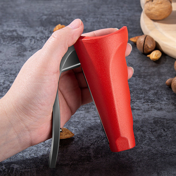 Close-up of universal nut cracker's gripping mechanism, showcasing its durable aluminum alloy construction.