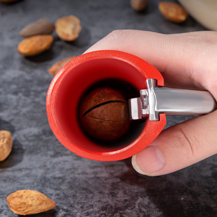 Kitchen counter setup with the universal nut cracker, ready for food prep and household use.