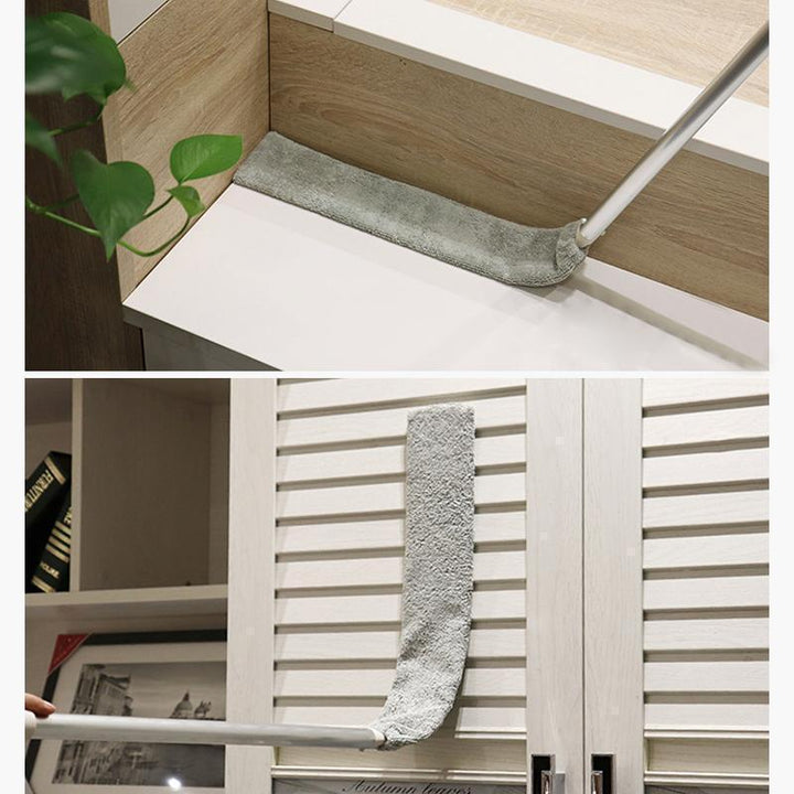 Versatile crevice cleaning brush with a durable long handle, essential for home dust removal