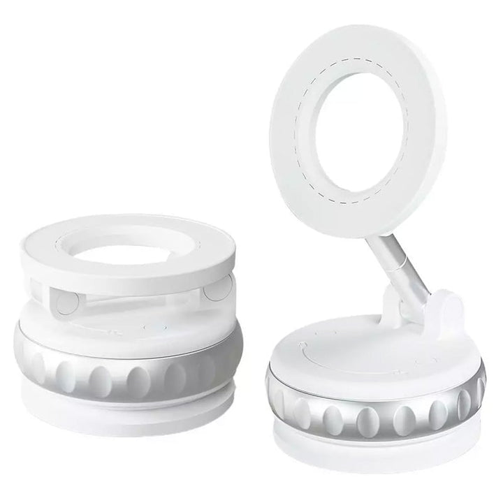 Securely mounted universal magnetic phone holder with a phone, illustrating 360° adjustment